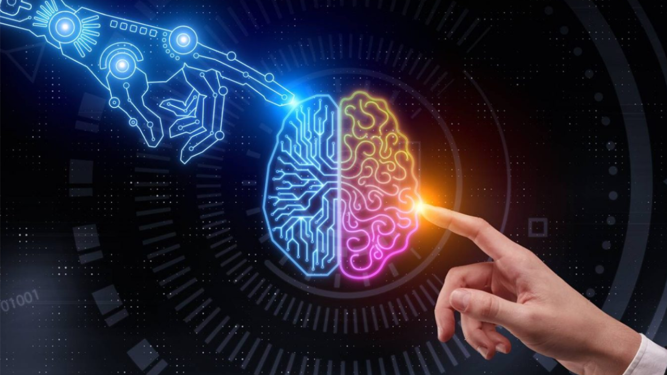 Two hands point to a neon representation of the brain.