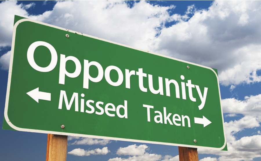A highway sign that says "Opportunity" and underneath offers two choices: Missed or Taken.